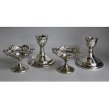 A pair of George V silver dwarf candlesticks, Birmingham 1936 and a pair of pedestal bon bon dishes,