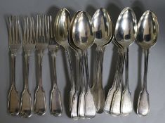 A harlequin set of ten William IV silver fiddle and thread pattern table spoons, London 1836/1837