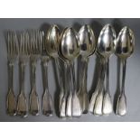 A harlequin set of ten William IV silver fiddle and thread pattern table spoons, London 1836/1837