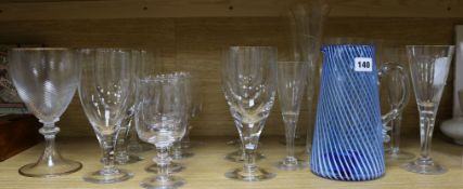 A group of assorted glasses, a blue glass jug and a Venetian goblet