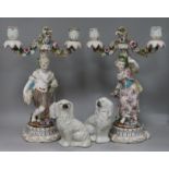 A pair of Sitzendorf style figurative candelabra and two Staffordshire dogs
