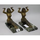 A pair of Egyptian figurative book ends