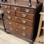 An 18th century style oak chest, of five short and three long drawers, W.90cm