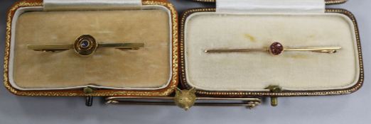 Three assorted gold bar brooches, all paste