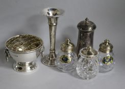 A Victorian silver pepper, a later small rose bowl, a specimen vase and a set of three silver