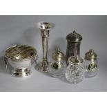 A Victorian silver pepper, a later small rose bowl, a specimen vase and a set of three silver