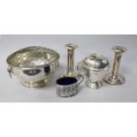 A modern silver rose bowl, a planished silver mug and cover, a pair of silver dwarf candlesticks and