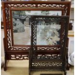 A Chinese pierced hardwood table screen with embroidered silk panel and a similar later screen