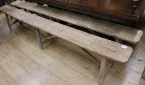 A pair of oak and elm benches, L.259cm