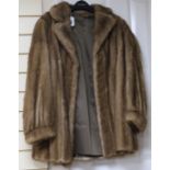 A blonde mink fur coat