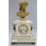 A white marble clock, with bronze bust surmount