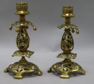 A pair of brass candlesticks