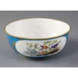 A Sevres style bleu celeste ornithological bowl, possibly a later decorated Sevres blank, diameter