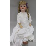 A Heubach Koppelsford bisque head doll