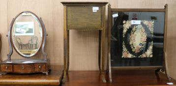 A George III toilet mirror, an Edwardian work table and a fire screen