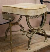 An X frame brass dressing stool