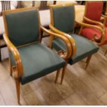 A pair of stylish 1940's beechwood elbow chairs