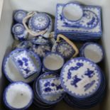 A large quantity of modern Chinese blue and white teaware and a stick stand