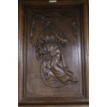 A 19th century French oak panel carved 'St Francis of Assiss, ex Chateau Champfleur'