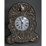 A silver clock