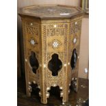 A Moorish mother of pearl inset occasional table, W.37cm