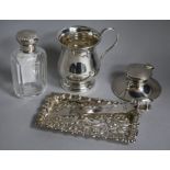 A George V silver capstan inkwell, a christening mug, a pin tray, a paper knife and a Waterman's