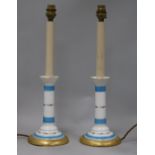 A pair of Victorian blue and white candlesticks adapted as lamps