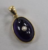 An Art Nouveau gold mounted cabochon, amethyst and pearl pendant