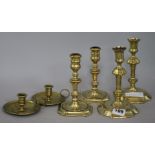 Four candlesticks and a pair of taper sticks