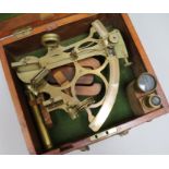 A brass sextant by T.L. Ainsley, South Shields, with mahogany box