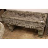 A composition stone trough W.90cm