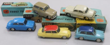 A Corgi Toys Morris Cowley Saloon No. 202 and four other boxed Corgi cars, including Rover 90 Saloon