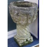 A reconstituted garden urn on pedestal, H.75cm