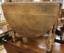 A stripped oak gateleg table, W.92cm