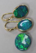 A pair of 18ct gold, black opal and diamond oval drop earrings and an unmounted black opal.