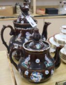 Two Measham pottery 'barge' teapots