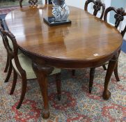 A 1930's walnut extending dining table, 178 x 106cm