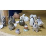 Eleven Royal Copenhagen and Bing & Grondahl models of animals, including Mouse on green chestnut (