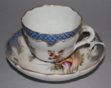 A Meissen blue ground coffee cup and saucer