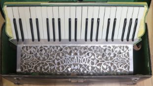 An L'Organola" Hohner accordian