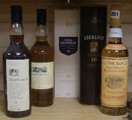 Five assorted bottles of whisky: Glenmorangie, Mortlach 16yo, Strathmill 12yo, Aberlour 10yo and