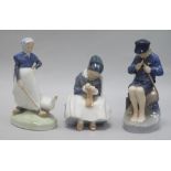 Three Royal Copenhagen figures, including Amager Girl Sewing, No. 1314, Boy Whittling, No. 905 and