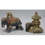 Two Japanese 'moriage' porcelain elephants