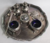 A pair of Victorian silver salts, a set of three silver condiments and a small quantity of silver