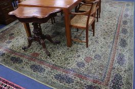 A Belgian cotton pile green ground Persian style carpet, 410 x 327cm