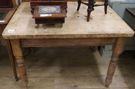 A pine kitchen table 104 x 83cm, H.73cm