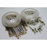 A pair of frosted glass beadwork tassled shades