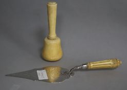 A late Victorian ivory handled silver presentation trowel by Charles Edwards, and mounted ivory