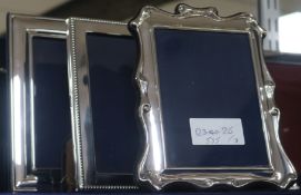 Three assorted 1980's/1990's silver mounted photograph frames, largest 20cm.
