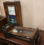 A late 19th century walnut Vienna wall clock, H.87cm and an American wall clock, H.66cm